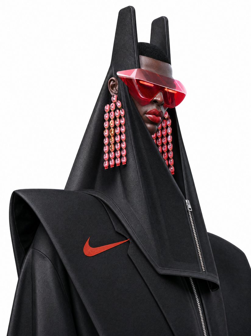Sculptural black figure with a tall pointed collar, red geometric glasses and beaded earrings.